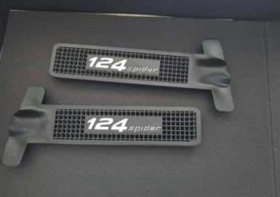 Dirt trap grille - for slot in metal structure in engine compartment side